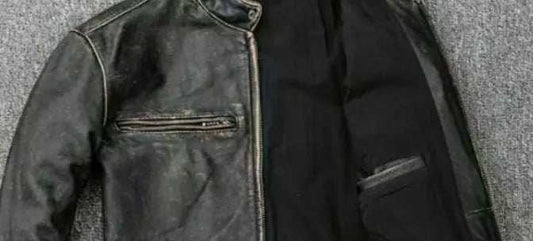 Blackened leather jacket showing darkened areas and discoloration due to various causes