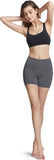 Model wearing women's high waisted yoga shorts and bra, showcasing a flattering fit and stretchable design.