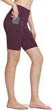 Model wearing women's high waisted yoga shorts with side pocket for phone, showcasing flattering compression fit and comfort.
