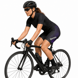 Cycling Shorts Womens Gel Padded MTB Riding Bicycle Knicks Ladies Chamois Pants worn by a female cyclist on a road bike.